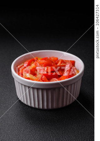 Delicious fresh saute sweet bell pepper slices with onion, salt, spices and herbs Delicious fresh saute sweet bell pepper slices with onion, salt, spices and herbs 106427314