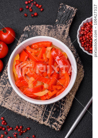 Delicious fresh saute sweet bell pepper slices with onion, salt, spices and herbs Delicious fresh saute sweet bell pepper slices with onion, salt, spices and herbs 106427317