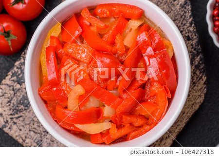 Delicious fresh saute sweet bell pepper slices with onion, salt, spices and herbs Delicious fresh saute sweet bell pepper slices with onion, salt, spices and herbs 106427318