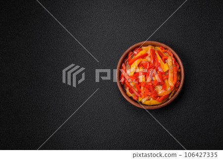 Delicious fresh saute sweet bell pepper slices with onion, salt, spices and herbs Delicious fresh saute sweet bell pepper slices with onion, salt, spices and herbs 106427335