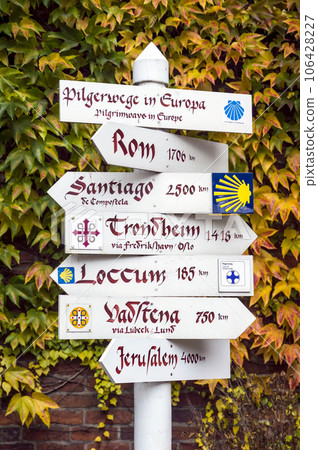 Sign showing pilgrimage destinations in Hamburg, Germany Sign showing pilgrimage destinations in Hamburg, Germany 106428227