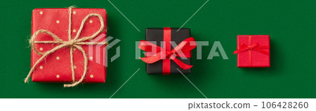 Christmas celebration concept. Gift on green background Christmas celebration concept. Gift on green background 106428260
