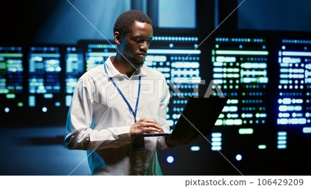African american specialist ensuring server farm systems provide redundancy, automatic failover and rapid reconfiguration of clusters to minimize failure of individual machines African american specialist ensuring server farm systems provide redundancy, automatic failover and rapid reconfiguration of clusters to minimize failure of individual machines 106429209