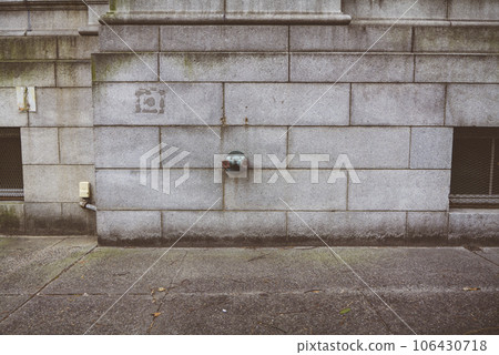 Fire hydrant water pipe, mounted in a building wall. Manhattan USA Fire hydrant water pipe, mounted in a building wall. Manhattan USA 106430718