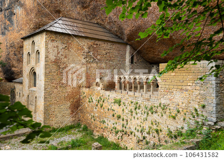 Old monastery of San Juan de la Pena - built right into rock. Huesca province, Aragon, Spain Old monastery of San Juan de la Pena - built right into rock. Huesca province, Aragon, Spain 106431582