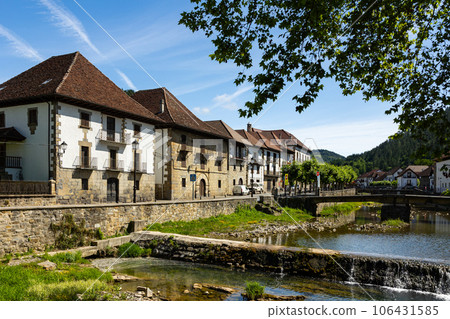 Ochagavia townscape with typical residential buildings along stone embankment Ochagavia townscape with typical residential buildings along stone embankment 106431585