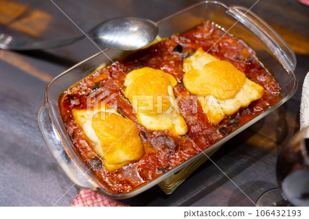 Appetizing cod served with samfaina vegetables Appetizing cod served with samfaina vegetables 106432193