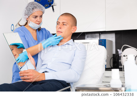 Man having consultation with doctor in clinic Man having consultation with doctor in clinic 106432338