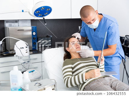 Woman having consultation with doctor in clinic Woman having consultation with doctor in clinic 106432555