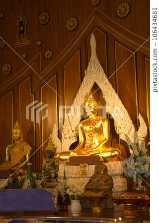Luang Pho Mongkhon Nimit is Buddha of the posture of Mara, carved from the whole stone, aged more than 400 years, is considered a sacred god that people worship at Wat Nong Phong Nok temple. Luang Pho Mongkhon Nimit is Buddha of the posture of Mara, carved from the whole stone, aged more than 400 years, is considered a sacred god that people worship at Wat Nong Phong Nok temple. 106434681