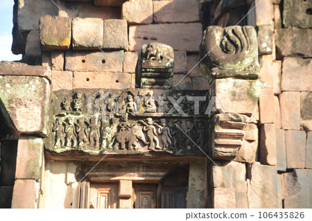 Narai Banthomasin carved stone slab on Phra That Narai Jeng Weng is a relic made of sandstone.It looks like a Khmer prang. Base built with a large laterite. Located at Sakhon Nakhon in Thailand. Narai Banthomasin carved stone slab on Phra That Narai Jeng Weng is a relic made of sandstone.It looks like a Khmer prang. Base built with a large laterite. Located at Sakhon Nakhon in Thailand. 106435826