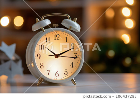 alarm clock on the table alarm clock on the table 106437285