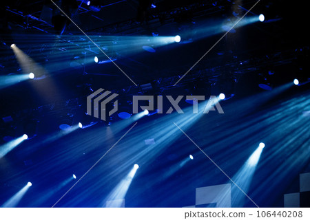 Glowing stage lights at a live concert Glowing stage lights at a live concert 106440208
