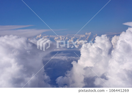 Clouds, view from the plane window Clouds, view from the plane window 106441269