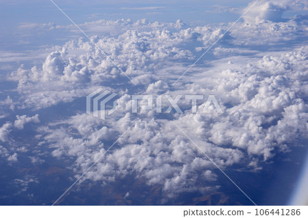 Clouds, view from the plane window Clouds, view from the plane window 106441286