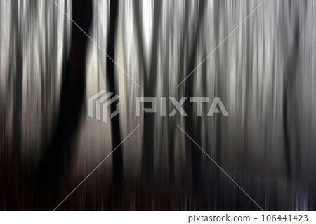 Abstract motion blur of trees in a forest 106441423