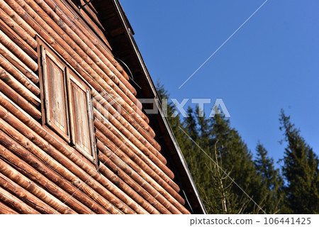 Natural wooden house detail 106441425