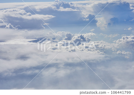 Clouds, view from the plane window Clouds, view from the plane window 106441799