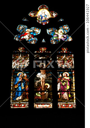 Stained glass window detail with Biblical scene 106441927