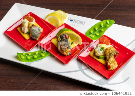 Fish meat on crackers Fish meat on crackers 106441931