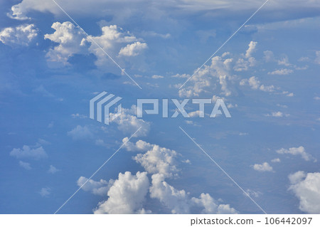 Clouds, view from the plane window Clouds, view from the plane window 106442097