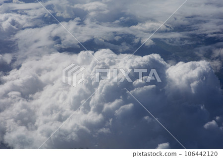 Clouds, view from the plane window Clouds, view from the plane window 106442120