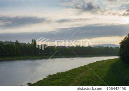 uzhhorod downtown by the river in the morning. cloudy weather in summer uzhhorod downtown by the river in the morning. cloudy weather in summer 106442498