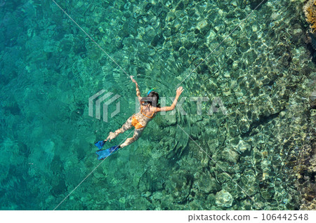 Sexy woman snorkeling Sexy woman snorkeling 106442548
