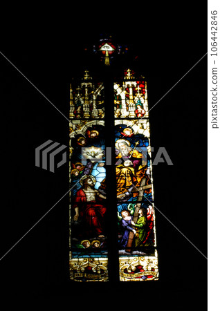 Stained glass window detail with Biblical scene 106442846