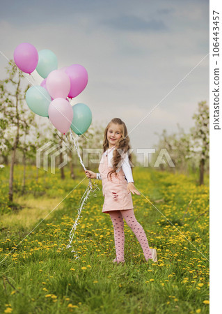 girl with colorful balloons girl with colorful balloons 106443457