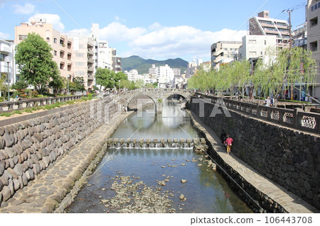 Scenery with Spectacles Bridge/An old stone arch bridge over the Nakashima River in Nagasaki City, Nagasaki Prefecture 106443708