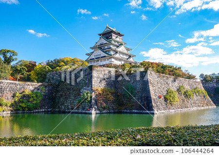 The Osaka Castle Keep, colored by the clear autumn sky and colored leaves (Osaka City, Osaka Prefecture) 106444264