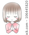 A young woman with a bob cut praying with her hands closed and her eyes closed 106445820