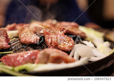 Bake raw lamb in a Genghis Khan pot Bake raw lamb in a Genghis Khan pot 106447821