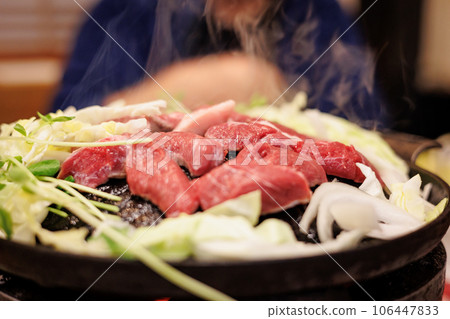 Bake raw lamb in a Genghis Khan pot Bake raw lamb in a Genghis Khan pot 106447833