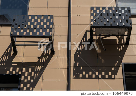 Facade of a modern residential building, building texture 106449073