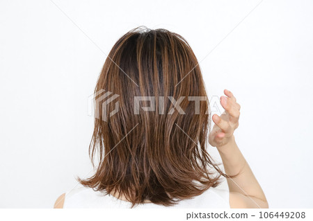 Woman's back hair care image Woman's back hair care image 106449208