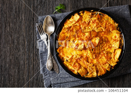 Frito chicken casserole in baking dish, top view 106451104