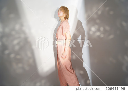 Fashion portrait image of a woman with light and shadow Fashion portrait image of a woman with light and shadow 106451496