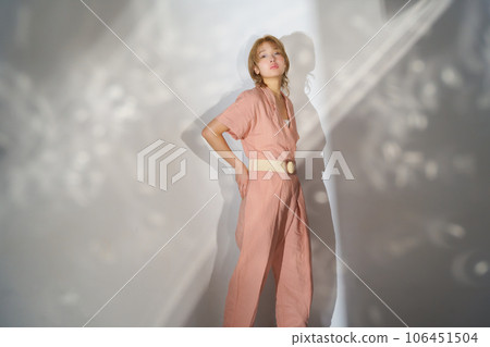 Fashion portrait image of a woman with light and shadow Fashion portrait image of a woman with light and shadow 106451504