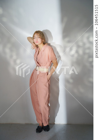 Fashion portrait image of a woman with light and shadow 106451515