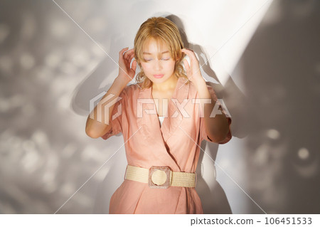 Fashion portrait image of a woman with light and shadow Fashion portrait image of a woman with light and shadow 106451533