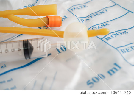 Foley catheter and urine drainage bag collect urine for disability or patient in hospital. 106451740