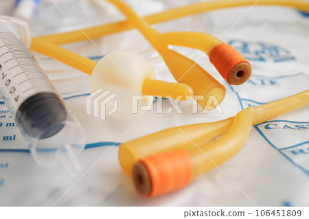 Foley catheter and urine drainage bag collect urine for disability or patient in hospital. 106451809