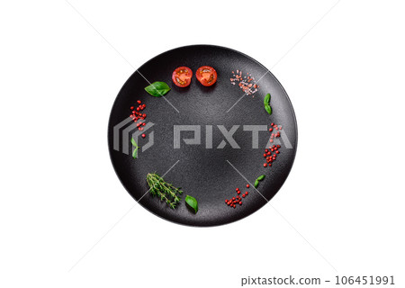 Ingredients for cooking cherry tomatoes, salt, spices and herbs Ingredients for cooking cherry tomatoes, salt, spices and herbs 106451991