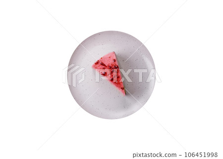 Delicious sweet dessert cheesecake with raspberry and pistachio flavor 106451998