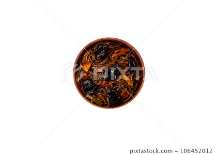 Delicious fresh buckwheat noodles or udon with mushrooms, peppers and other vegetables 106452012