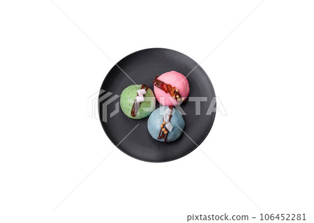 Delicious sweet colorful mochi desserts or ice cream with rice dough and toppings Delicious sweet colorful mochi desserts or ice cream with rice dough and toppings 106452281