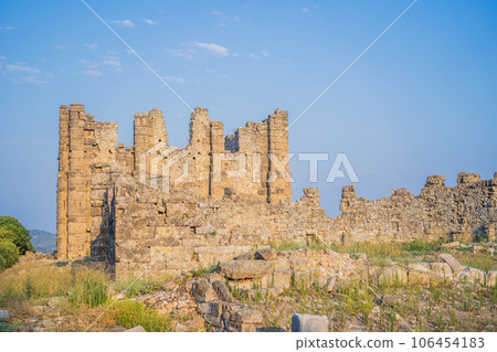 Aspendos Ancient City. Aspendos acropolis city ruins, cisterns, aqueducts and old temple. Aspendos Antalya Turkey. turkiye Aspendos Ancient City. Aspendos acropolis city ruins, cisterns, aqueducts and old temple. Aspendos Antalya Turkey. turkiye 106454183