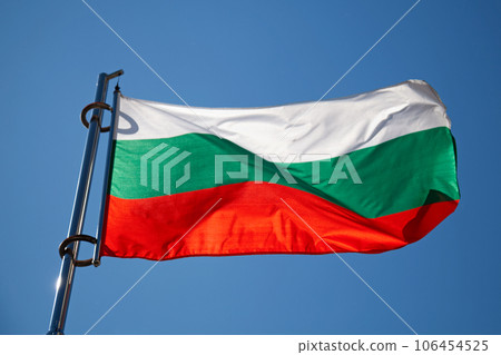 Bulgarian flag waving atop of its pole 106454525